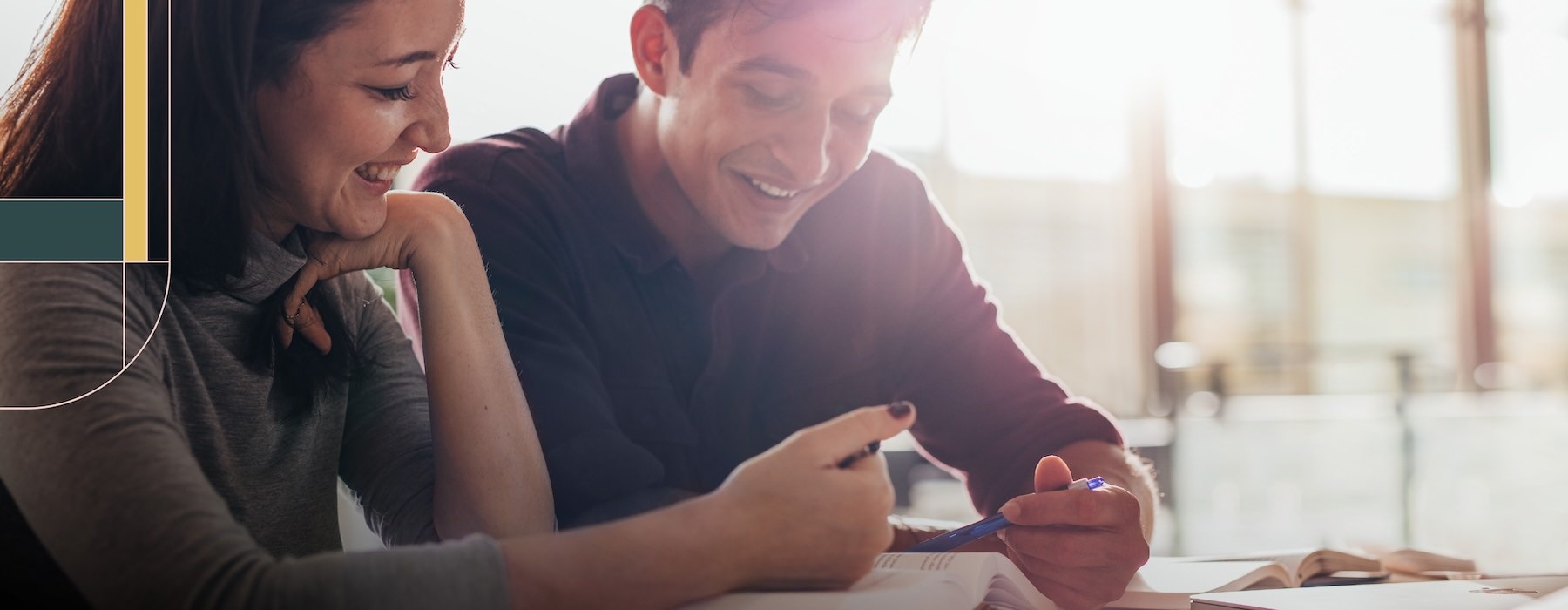 a man and a woman looking at a phone