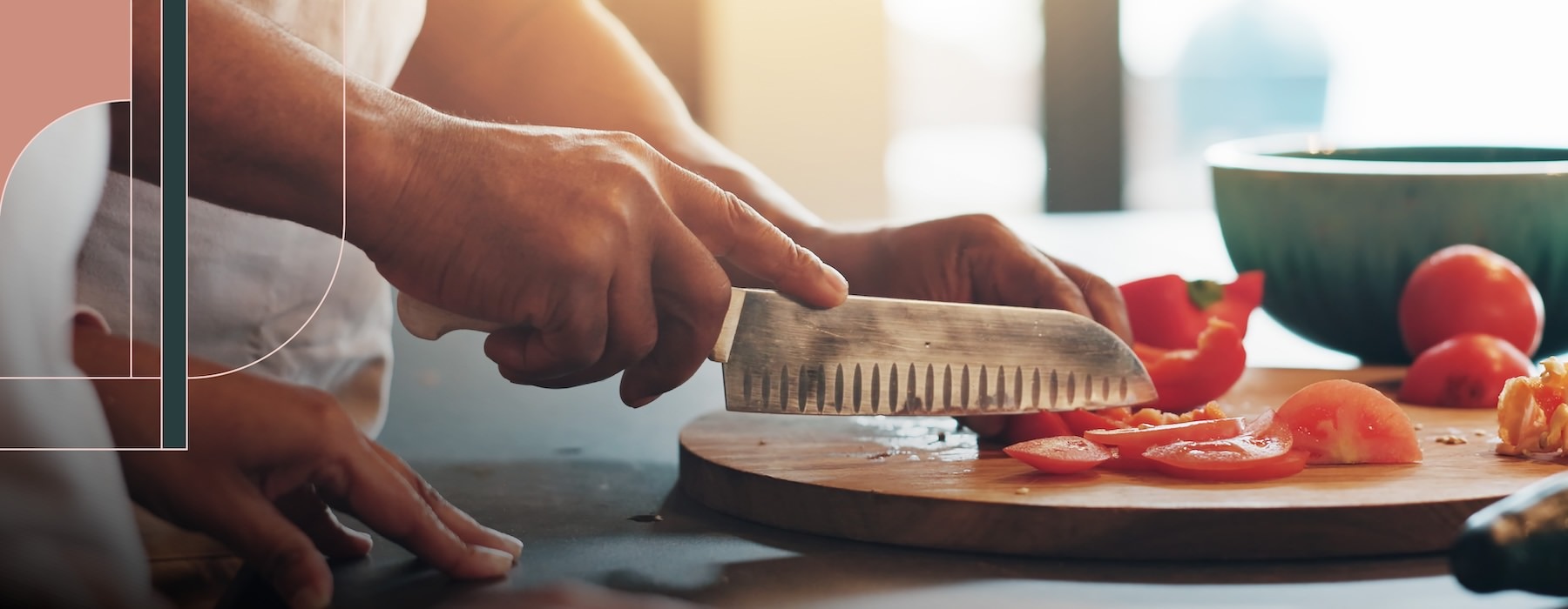 a person cutting tomatoes